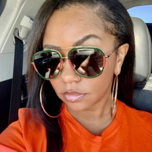 woman wearing Gucci GG0062S sunglasses