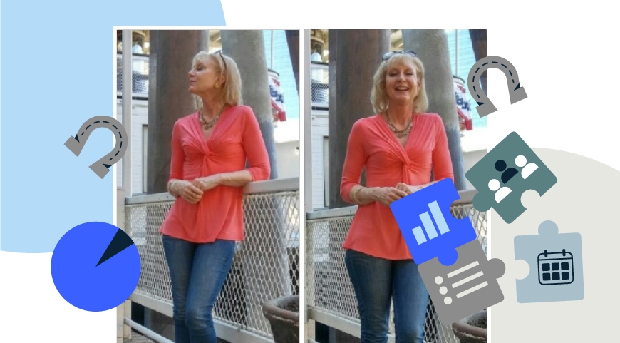 Julie standing on a bridge in a red shirt