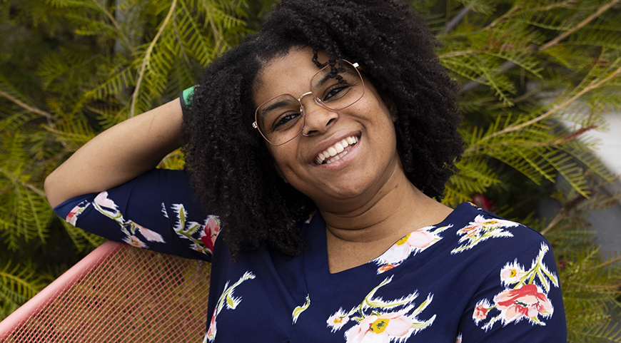 smiling woman wearing glasses